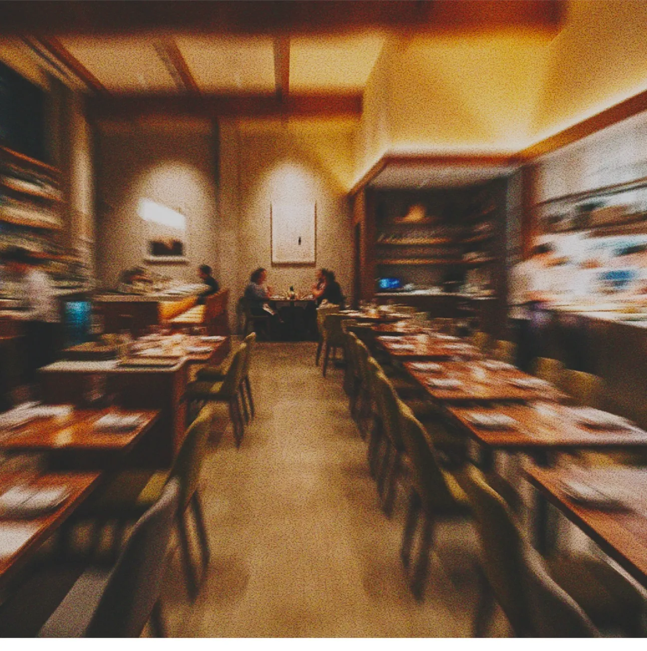 Inside a warm, busy restaurant